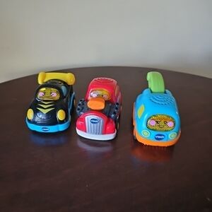 Vtech Go Go Smart Wheels 3 PC Fire Truck Race Car SUV Lights and Sounds French V